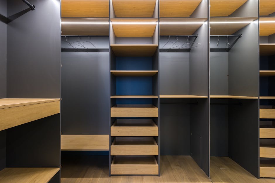 Wooden closet shelves with folded linens