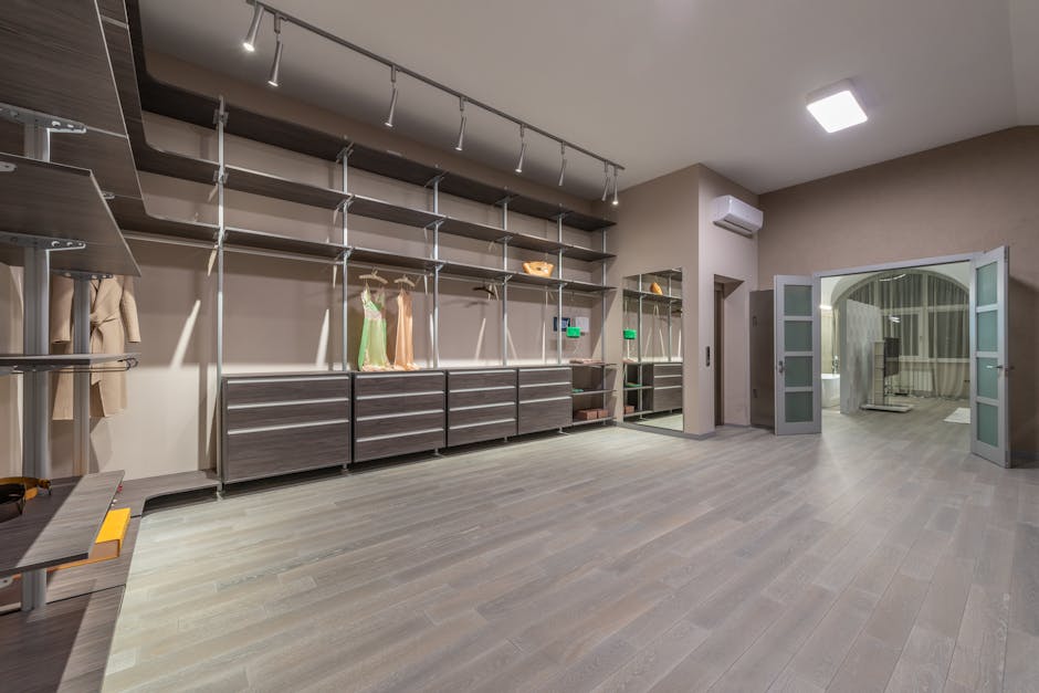 Luxurious modern walk-in closet design with custom shelving